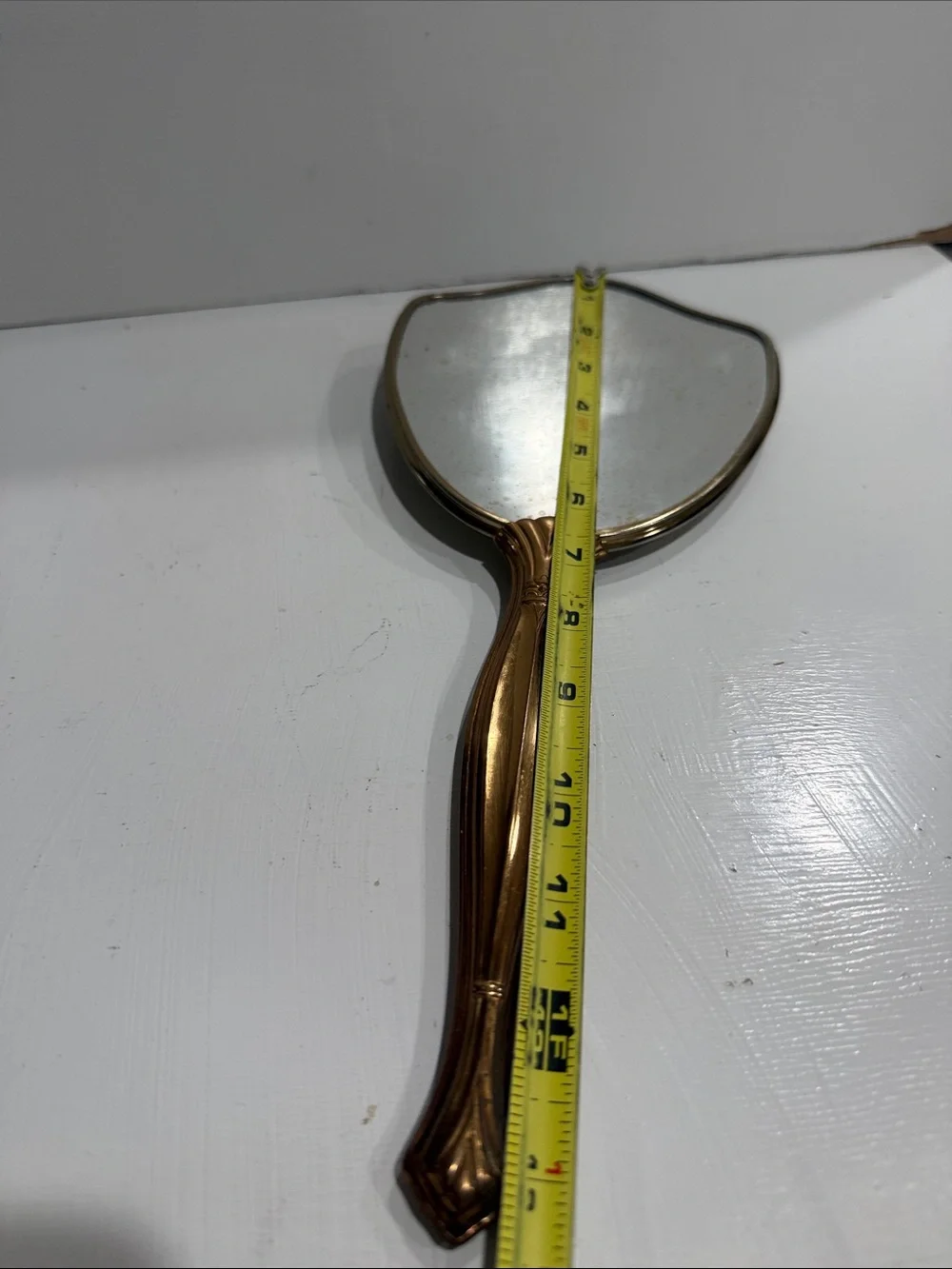 Mid Century Hollywood Regency Hand Held Mirror with Floral Detail 1950’s